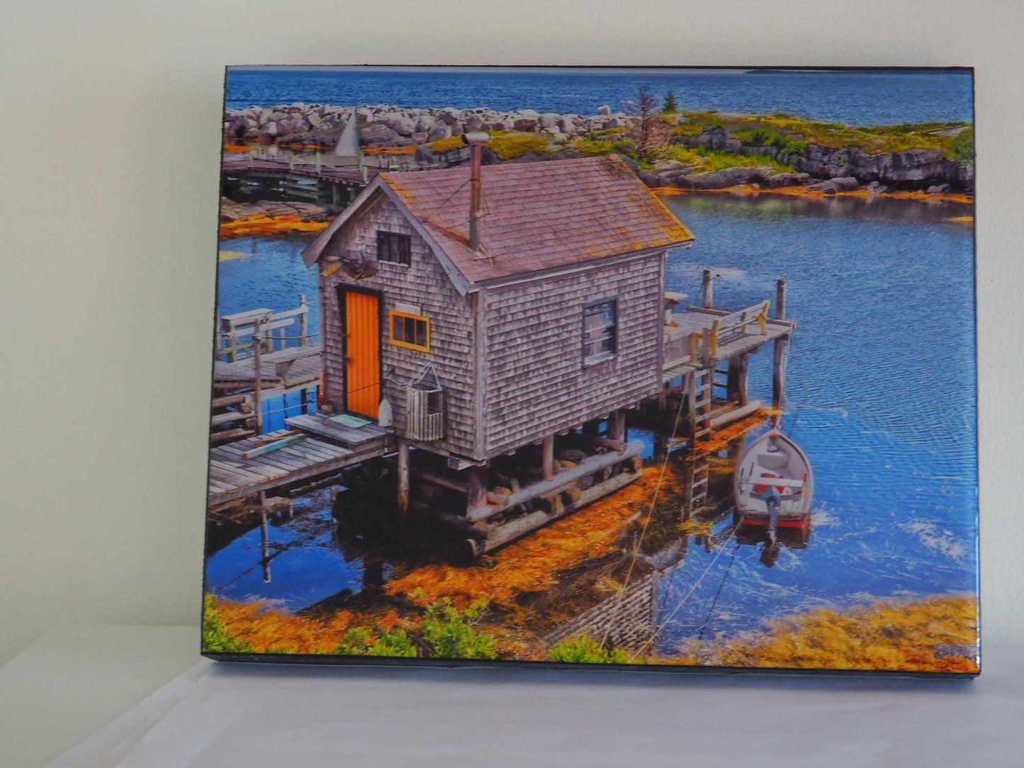 Spectacular view of Blue Rocks harbour featuring a picturesque fisherman's boathouse. Photography 8 x 10 inches covered with resin. Ready-to-hang in your favorite room.