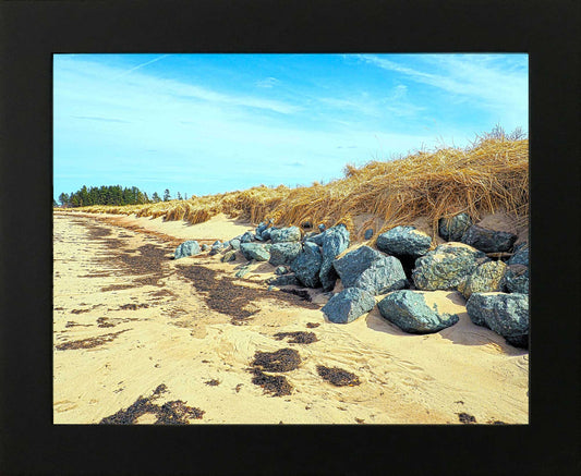 Nova Scotia's beaches, rock colors. blue becomes brilliant. High quality Photography 10.75 x 13.75 inches recovered with resin in a black frame 14 x 16.75 inches. ready to hang.