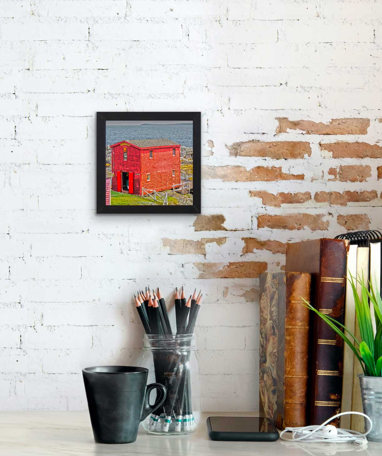 Spectacular view of Blue Rocks harbour featuring a picturesque red barn.   Photography 7.5 x 7.5 inches covered with resin in a handmade black wooden frame 9 x 9 inches.  Ready-to-hang in your favorite room.