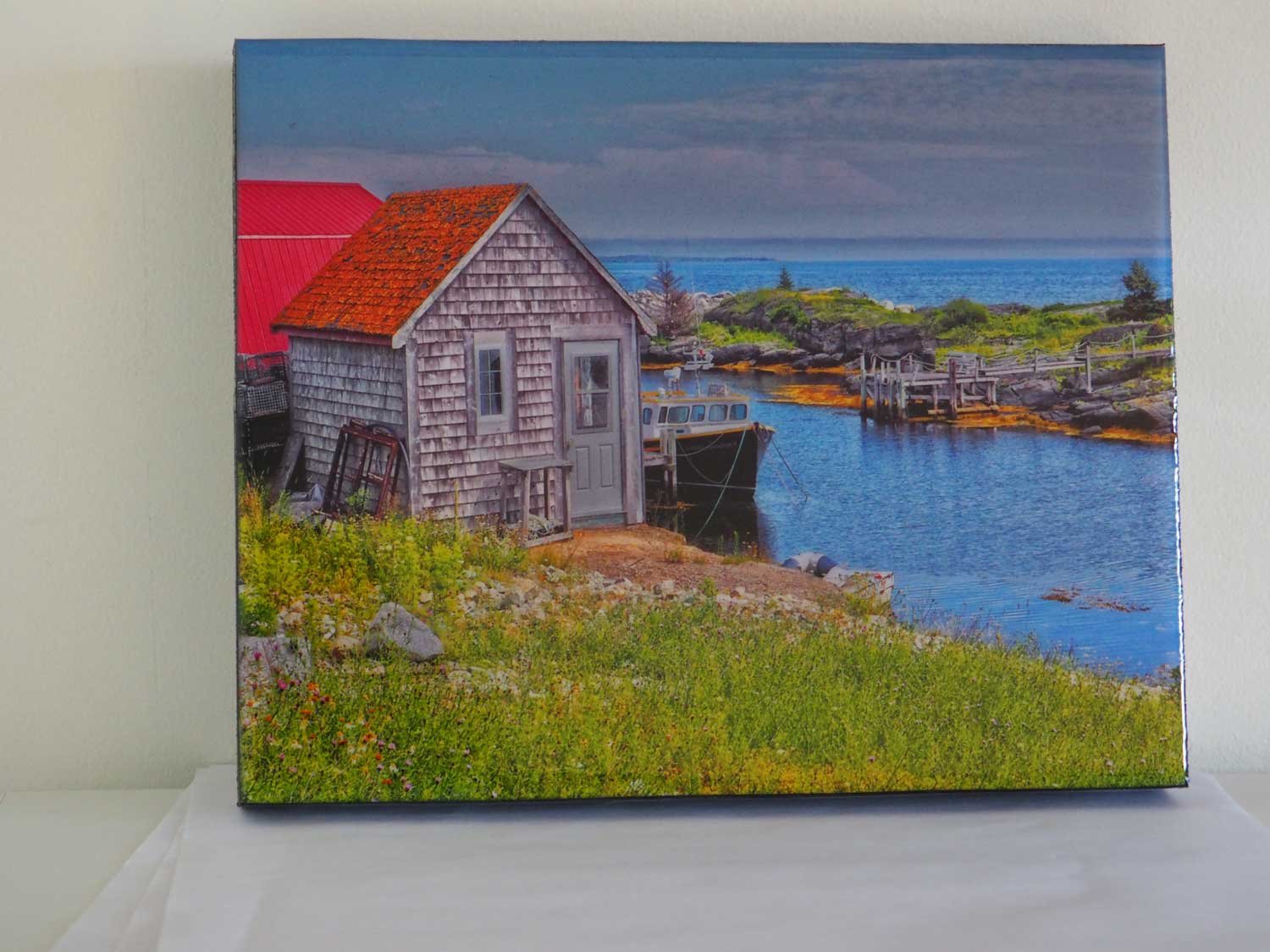 Spectacular view of Blue Rocks harbour featuring a picturesque shingle cabin. Photography 8 x 10 inches covered with resin. Ready-to-hang in your favorite room.