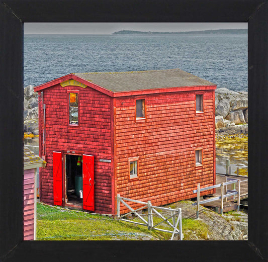 Spectacular view of Blue Rocks harbour featuring a picturesque red barn. Photography 7.5 x 7.5 inches covered with resin in a handmade black wooden frame 9 x 9 inches. Ready-to-hang in your favorite room.
