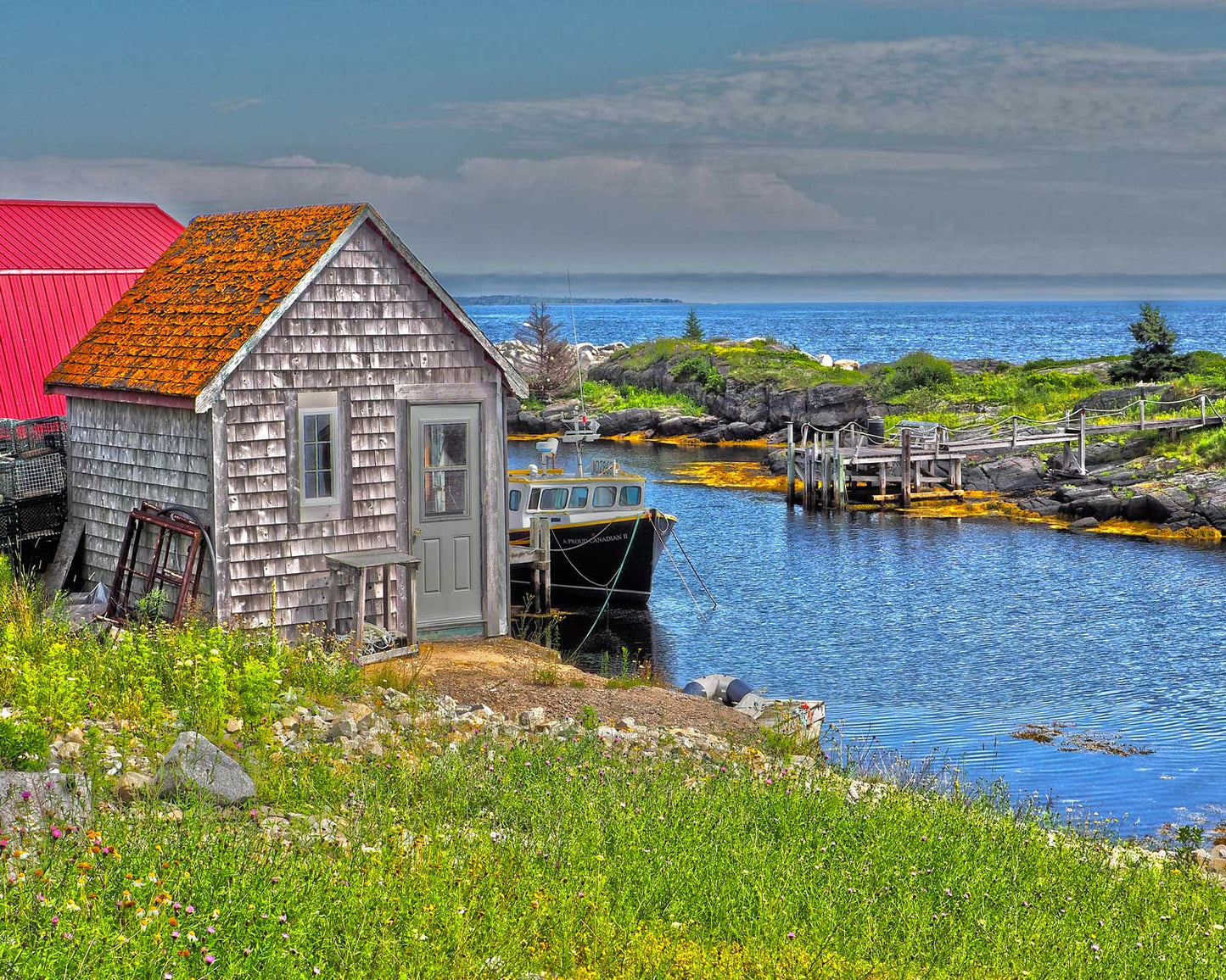 Spectacular view of Blue Rocks harbour featuring a picturesque shingle cabin. Photography 8 x 10 inches covered with resin. Ready-to-hang in your favorite room.
