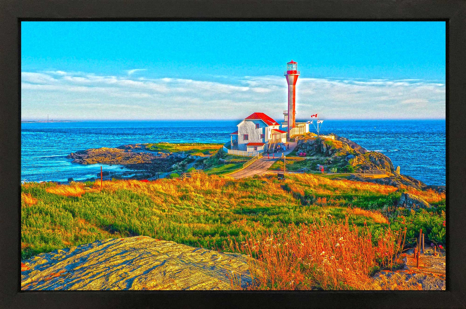 Cape Forchu Lighthouse, Yarmouth Harbour , emblematic of Nova Scotia's coastal heritage. This 10.5 x 16.5 inches photograph was printed on high quality paper. handmade black frame 12 x 18 inches. Resin has been applied to protect the photo. Ready to hang.