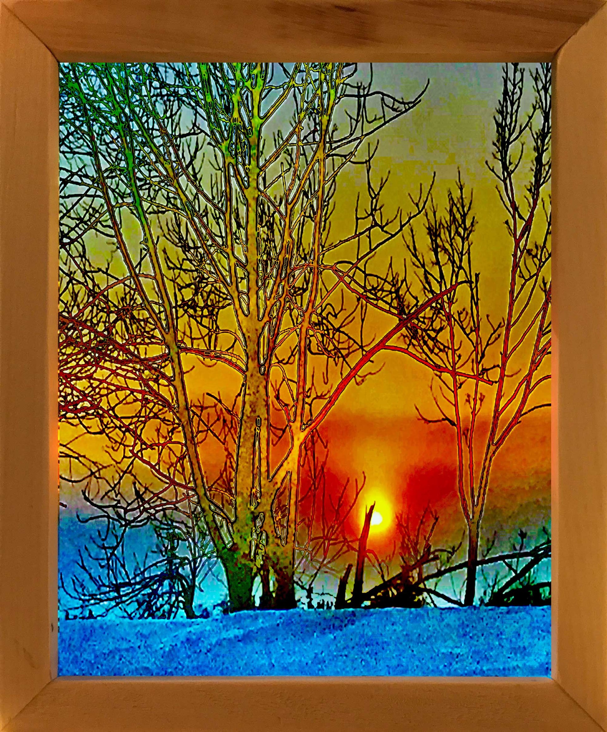 This 8.6 x 6.75 inches photography has been printed on two vellum papers to create a stained glass effect. Sunset in Pictou. Two pieces of glass were cut and placed in a handmade wooden frame 10 x 8 inches. Hooks and chains were added to allow them to be hung in a window, allowing light to pass through the frame.