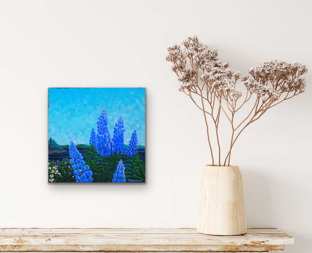 Lupin season in the Maritime region nova scotia on the Atlantic Ocean. blue vibrant sky original painting by a professional Canadian landscape artist. visual art ready to hang on your wall.