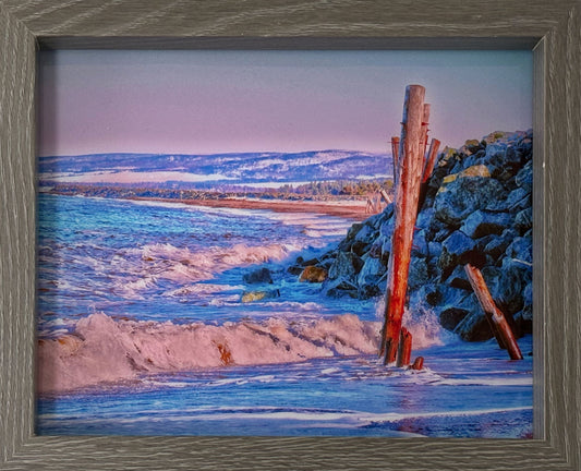 Melmerby Pillars captures the beach's transformation before winter sets in. Sea spray from the chilly waters of northern Nova Scotia forming ice along the shoreline.  High quality photography 7,5 x 9,5 inches recovered with resin in a classic frame 9 x 11 inches. Ready to hang.