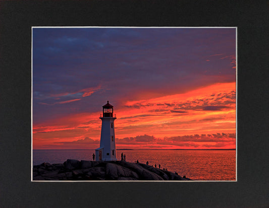 twilight sky at Peggys Cove Lighthouse, a dramatic contrast of purple and orange.  Print on hight quality paper 10 x 16 inches with a black mat 13.5 x 19.5 inches.  Place the photography in a frame of your choice and hang it in your favorite decor.