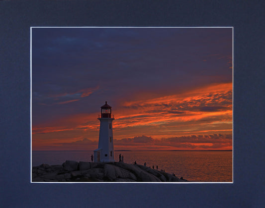 twilight sky at Peggys Cove Lighthouse, a dramatic contrast of purple and orange. Print on hight quality paper 6.25 x 10.25 inches with a navy blue mat 9 x 13 inches.  Place the photography in a frame of your choice and hang it in your favorite decor.