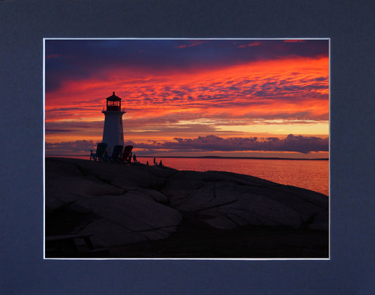 twilight sky at Peggys Cove Lighthouse, a dramatic contrast of purple and orange. Print on hight quality paper 7.75 x 9.75 inches with a navy blue mat 10 x 12 inches.  Place the photography in a frame of your choice and hang it in your favorite decor.