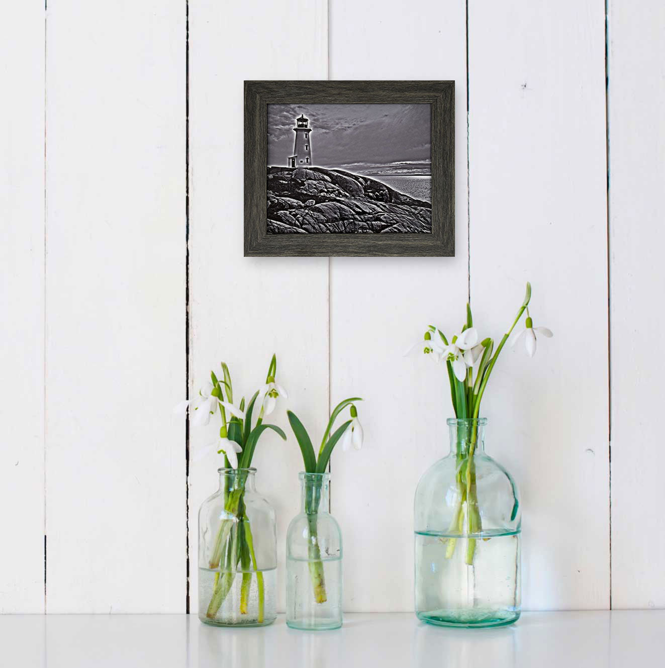 Monochrome photography of Peggys Cove, Nova Scotia.  High quality photography 7.5 x 9.5 inches covered with resin in a classic frame 10.25 x 12.25 inches.  Ready to hang in a room of your choice.