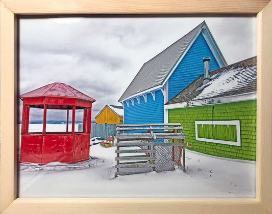 The Ship Hector arrived in Pictou Harbour in Nova Scotia.This photograph captures the splendor of Pictou's Hector Heritage Quay, showcasing its colorful buildings under a blanket of snow. The bright hues of the buildings contrast with the snowy landscape The photo measures 10.5 x 13.5 inches, framed in an natural handmade wooden frame measuring 12 x 15 inches.. Ready to hang