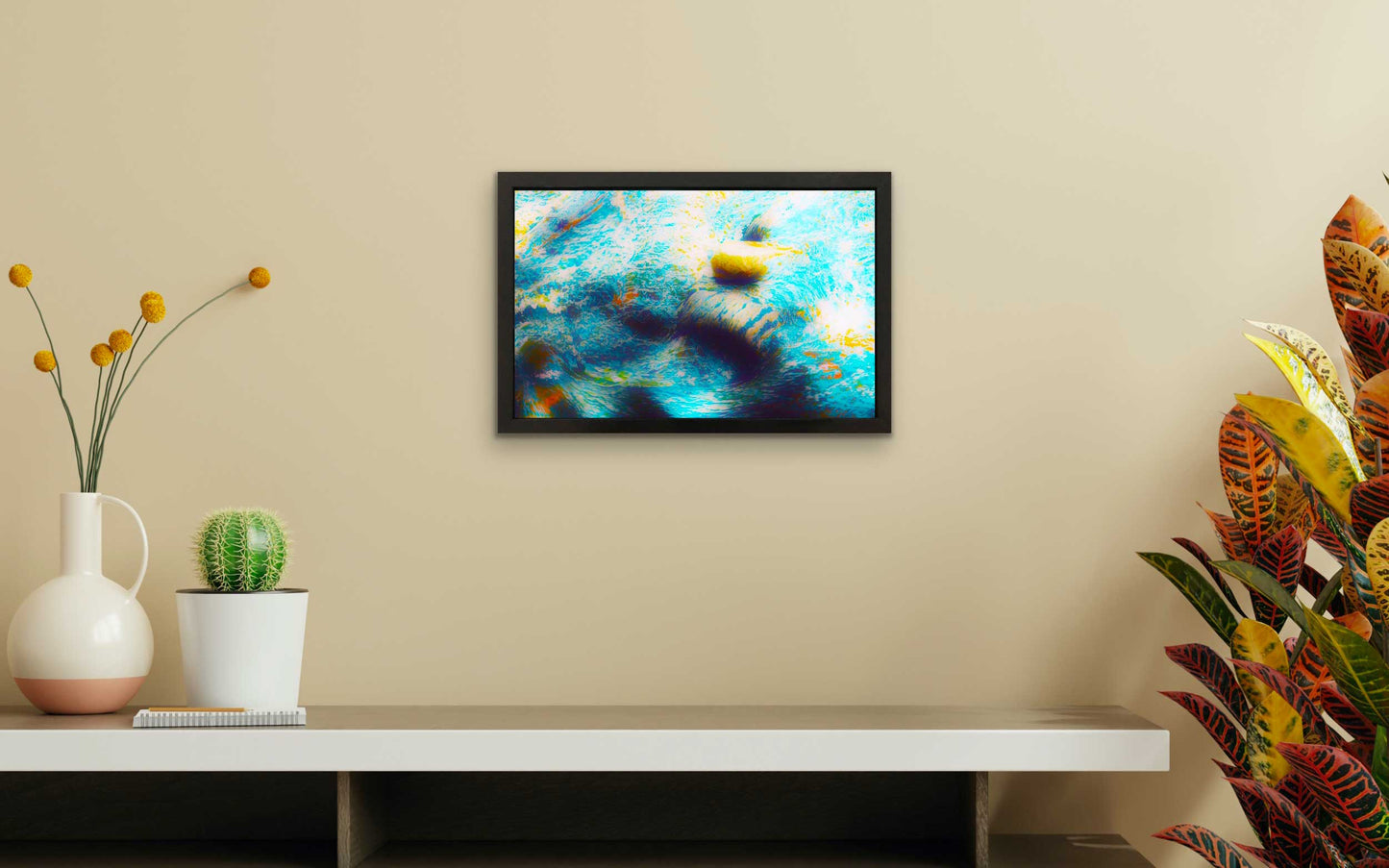The movement in the water, the color of rocks and shells are great inspirations for photography.  Photograph measuring 10.5 x 16.5 inches, resin-coated in a handmade black wooden frame 12 x 18 inches. This frame is ready to install in your new decor.